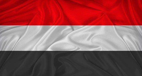 Flag of Yemen with cloth texture. Close up of Yemen flag waving