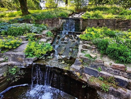 Small waterfall in the park, Nördlicher Park, Bad Nauheim, Hesse, Germany