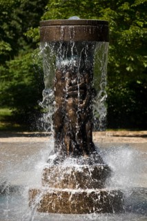 Fountain of Knowledge by Heinrich Jobst in the large spa gardens of Bad Nauheim, Hesse, Germany