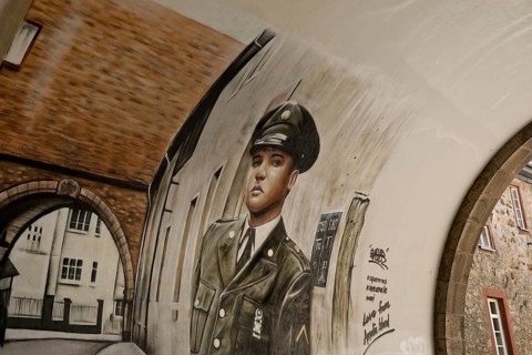 Graffiti by Gnasher in the archway, the castle gate was the backdrop for the cover of the Elvis