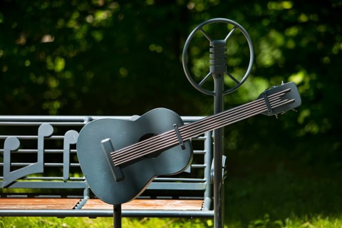 Elvis bench with guitar and microphone, Elvis Presley lived in Bad Nauheim, Hesse, Germany during