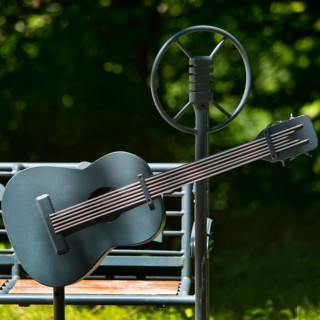Elvis bench with guitar and microphone, Elvis Presley lived in Bad Nauheim, Hesse, Germany during