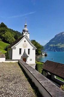 Roman Catholic Church of St Idda, Lake Lucerne in the background, Bauen, Canton, Uri, Switzerland