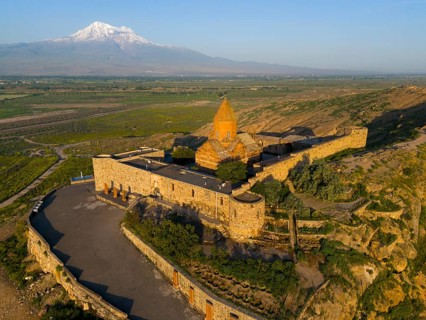 View of a historic monastery with Mount Ararat in the background, aerial view, Chor Wirap