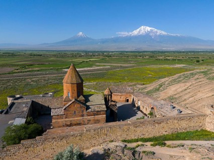 Monastery complex with a view of Mount Ararat and the surrounding landscape, aerial view, Chor