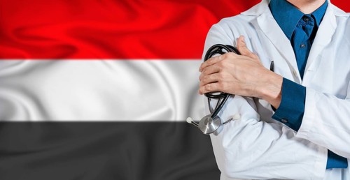 Doctor with stethoscope on Yemen flag. Doctor holding stethoscope on Yemen flag