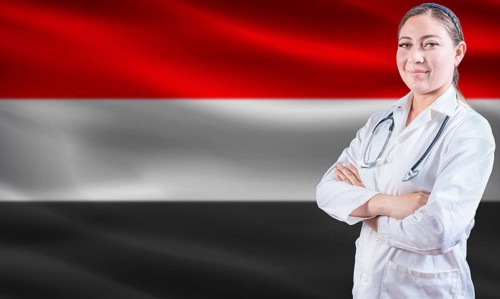 Female doctor on Yemen flag. Doctor with crossed arms on Yemen flag. Yemeni health and care concept