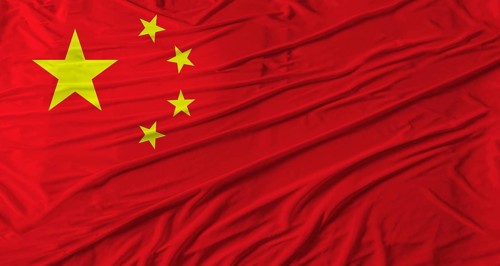 Close up of China flag waving. Flag of China with cloth texture