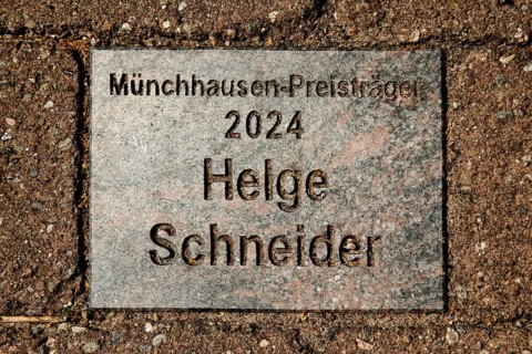 Sign for the 2024 Münchhausen Award winner Helge Schneider in the Münchhausen town of Bodenwerder,