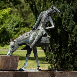 Münchhausen fountain by Bruno Schmitz with Münchhausen on the halved horse, Bodenwerder,
