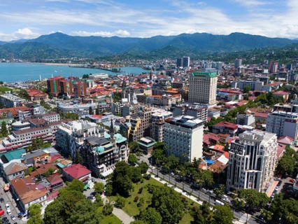 Panoramic view of a city with mountains and sea in the background, aerial view, Batumi, Black Sea,