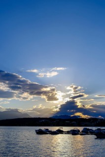 Sunset at the lake near Neuegg am Faaker See, behind Dobratsch, Carinthia, Austria