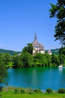 Maria Wörth pilgrimage church, on the southern shore of Lake Lake Wörth, Carinthia, Austria