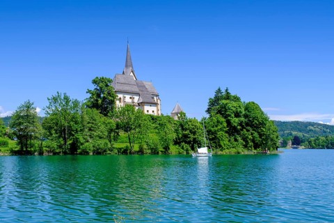 Maria Wörth pilgrimage church, on the southern shore of Lake Lake Wörth, Carinthia, Austria