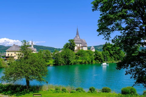 Maria Wörth pilgrimage church, on the southern shore of Lake Lake Wörth, Carinthia, Austria