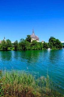 Maria Wörth pilgrimage church, on the southern shore of Lake Lake Wörth, Carinthia, Austria