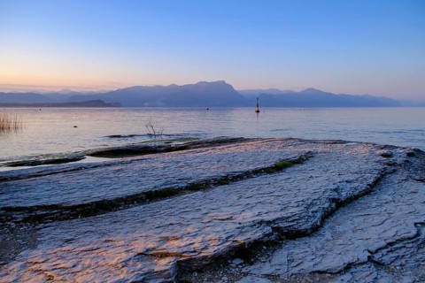Sunset at Lido delle Grotte, Jamaica Beach, Sirmione on Lake Garda, Veneto, Veneto, Italy