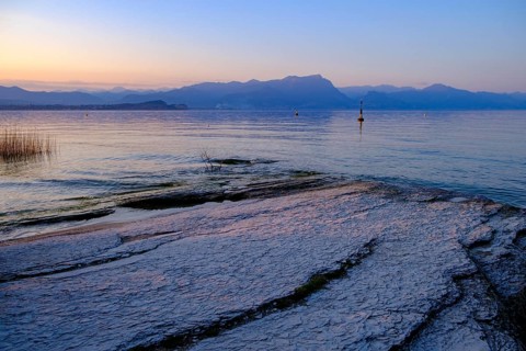 Sunset at Lido delle Grotte, Jamaica Beach, Sirmione on Lake Garda, Veneto, Veneto, Italy