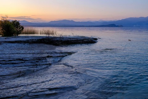 Sunset at Lido delle Grotte, Jamaica Beach, Sirmione on Lake Garda, Veneto, Veneto, Italy