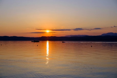 Sunset at Lido delle Grotte, Jamaica Beach, Sirmione on Lake Garda, Veneto, Veneto, Italy