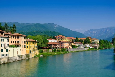 Old town centre on the Brenta, from the Ponte degli Alpini, Bassano del Grappa, Veneto, Italy