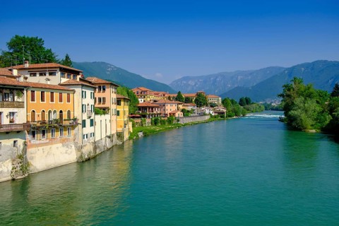 Old town centre on the Brenta, from the Ponte degli Alpini, Bassano del Grappa, Veneto, Italy