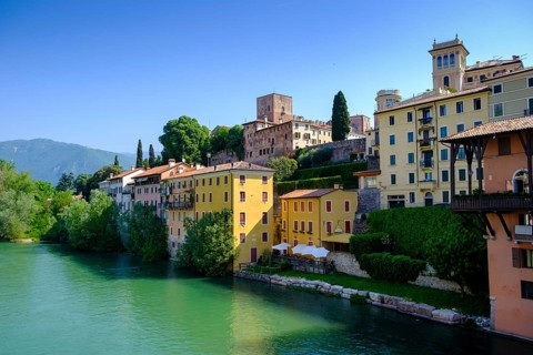 Old town centre on the Brenta, from the Ponte degli Alpini, Bassano del Grappa, Veneto, Italy
