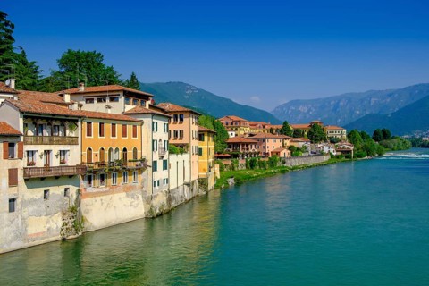 Old town centre on the Brenta, from the Ponte degli Alpini, Bassano del Grappa, Veneto, Italy