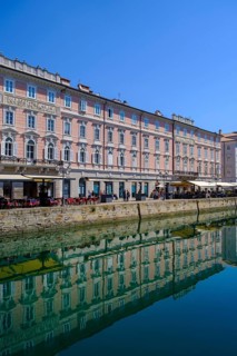 Commercial and residential buildings on the Grand Canal, Borgo Teresiano, Trieste, Adriatic Sea,