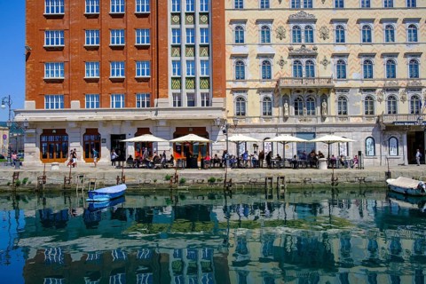 Commercial and residential buildings on the Grand Canal, Borgo Teresiano, Trieste, Adriatic Sea,