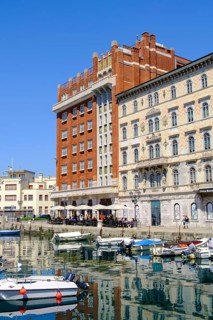Commercial and residential buildings on the Grand Canal, Borgo Teresiano, Trieste, Adriatic Sea,