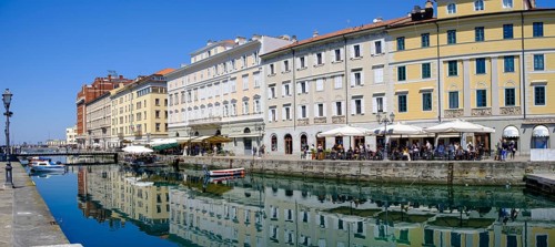 Commercial and residential buildings on the Grand Canal, Borgo Teresiano, Trieste, Adriatic Sea,
