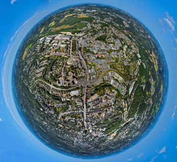 Aerial view, city centre view, street crossing Rahmedestraße and Heedfelder Straße, earth globe,