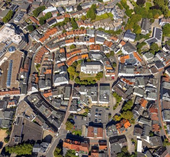 Aerial view, circular residential complex in the city centre with evang. Erlöserkirche,