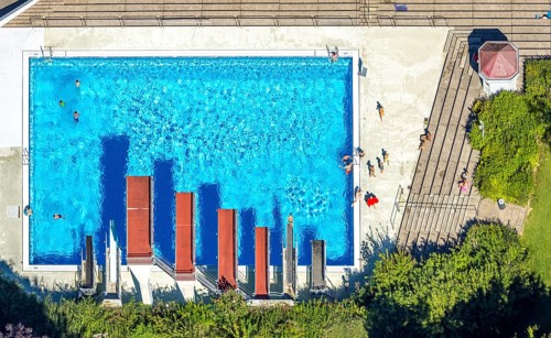 Aerial view, open-air swimming pool Nattenberg, swimming pool with bathers and eight diving boards,