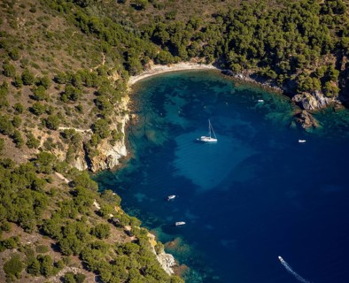 Bays for sailboats and divers, Mediterranean Bay of Roses, blue water, Roses, Costa Brava,
