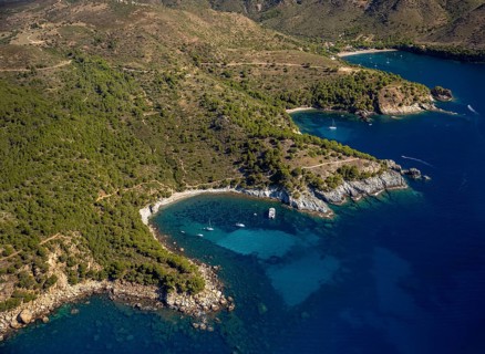 Bays for sailboats and divers, Mediterranean Bay of Roses, blue water, Roses, Costa Brava,
