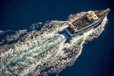 Excursion boat to Cap Norfeu, Cap de Creuers Cadaques, Mediterranean Bay of Roses, blue water,