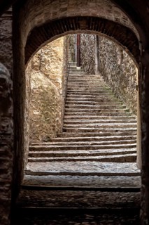 Call, Jewish quarter in the old town of Girona, stone gate with stone steps, alleys in the old town