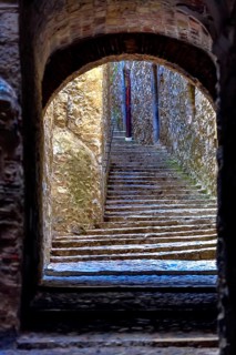 Call, Jewish quarter in the old town of Girona, stone gate with stone steps, alleys in the old town