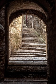 Call, Jewish quarter in the old town of Girona, stone gate with stone steps, alleys in the old town