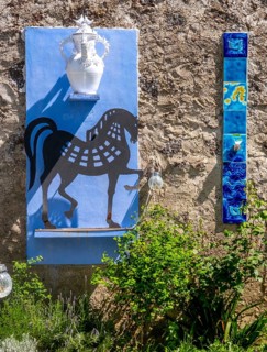 Sardinia, artwork wall fresco with horse symbol, white jug and mosaic stones, Tinnura, Europe,