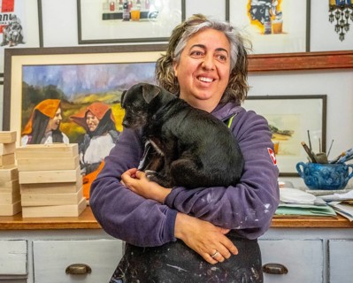 Sardinia, Pina Monne, portrait of woman and dog on arm, artist, Tinnura, Europe, province of