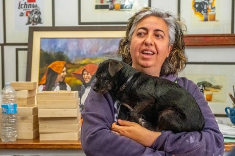 Sardinia, Pina Monne, woman portrait and dog on arm, artist, Tinnura, Europe, Oristano province,