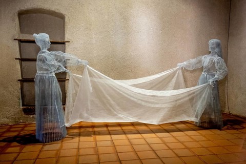 Sardinia, woman as grid model in the museum at work, Fordongianus, Europe, Province of Oristano,