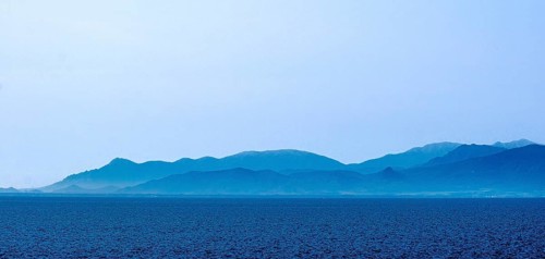 Sardinia, sea and mountains dipped in blue colour, Tharros, Europe, Province of Oristano, Italy,