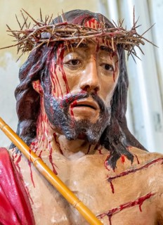 Sardinia, maltreated and bleeding face of Jesus with crown of thorns, Bosa, Europe, Province of