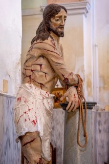 Sardinia, maltreated and bleeding Jesus figure, Bosa, Europe, Province of Oristano, Italy, nude