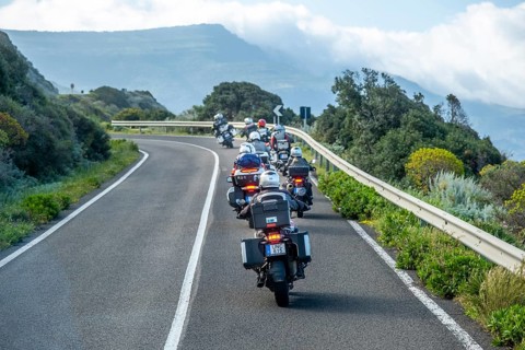 Sardinia, biker motorcyclist on the mountainous coastal road, Villanova Monteleone, Europe,