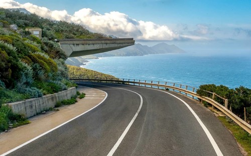 Sardinia, dreamlike coastal road by the sea, bridge projection, Villanova Monteleone, Europe,